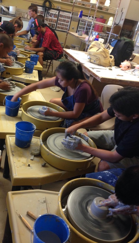 Students working with the new pottery wheels at Lahainaluna High School