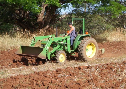 The newly repaired tractor at work at the Lahainaluna High School Agriculture department
